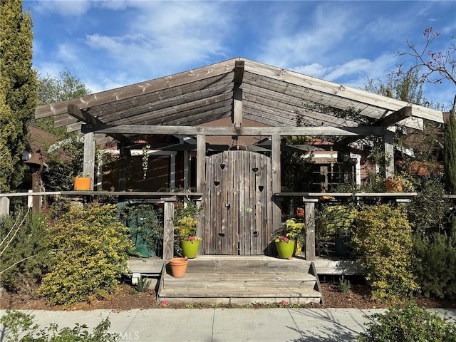 exterior space featuring a pergola