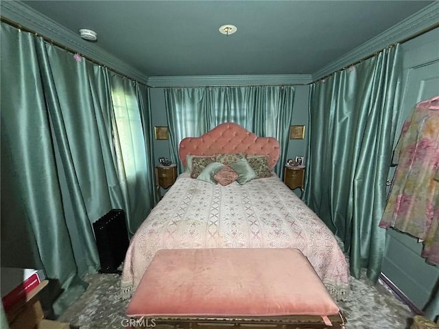 bedroom with ornamental molding