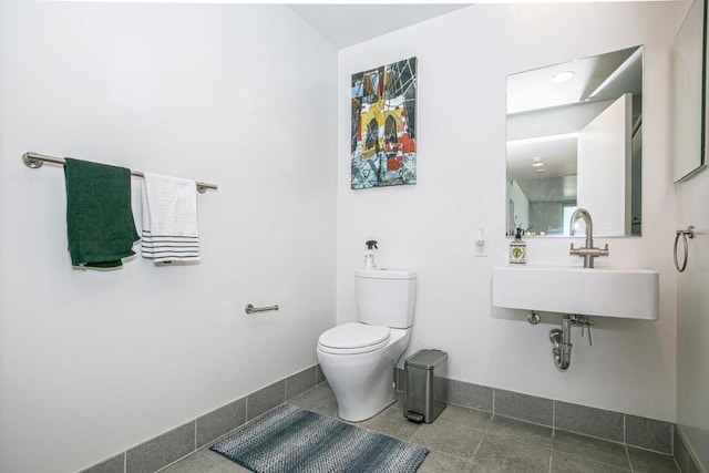 bathroom with toilet and sink