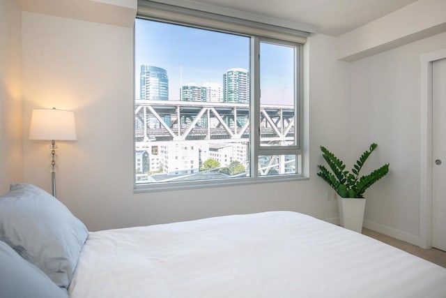 bedroom featuring multiple windows