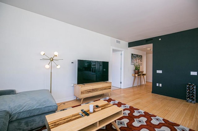 living room with hardwood / wood-style floors