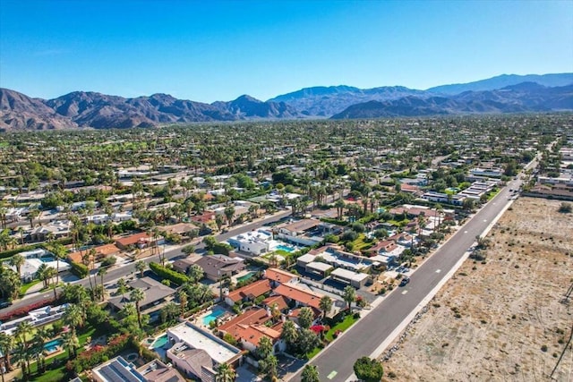 drone / aerial view featuring a mountain view