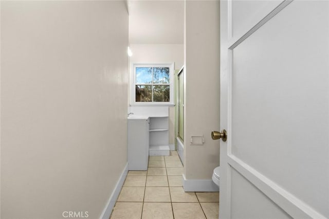 full bathroom with toilet, tile patterned flooring, enclosed tub / shower combo, and vanity