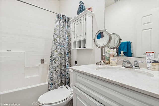 full bathroom featuring toilet, shower / bath combination with curtain, and vanity