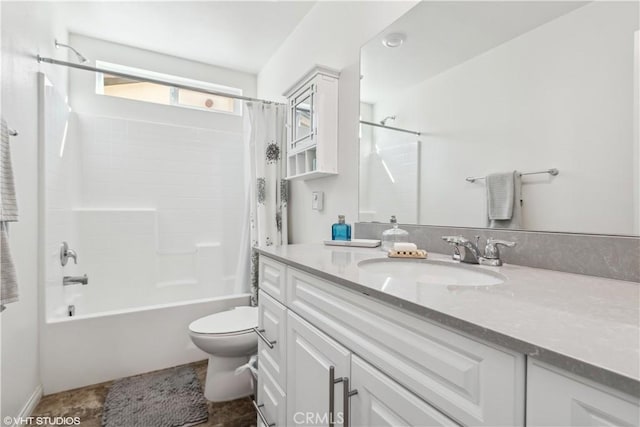 full bathroom with toilet, vanity, and shower / tub combo with curtain