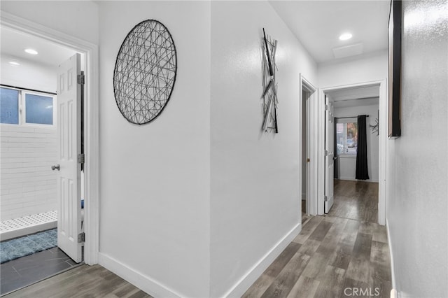 hall with dark wood-type flooring