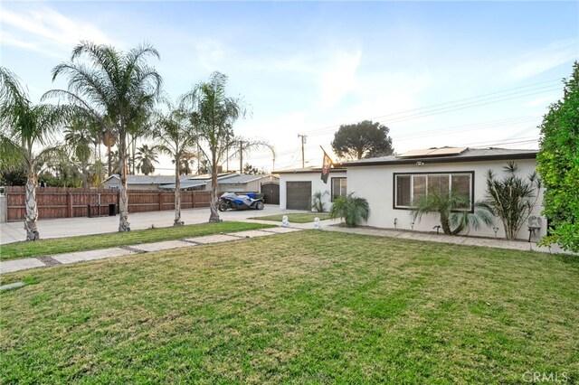 view of yard with a garage