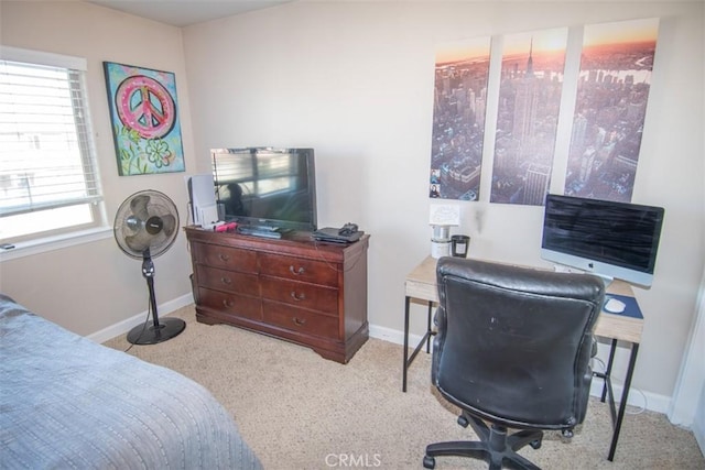 bedroom featuring light carpet