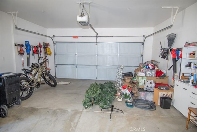 garage featuring a garage door opener