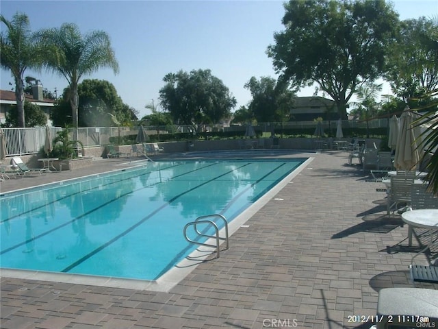 view of pool featuring a patio area