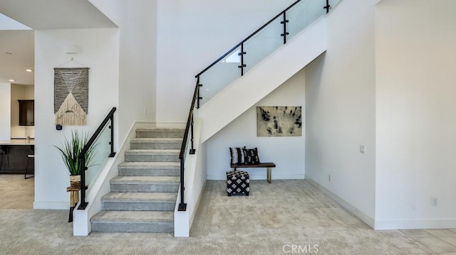 staircase with carpet