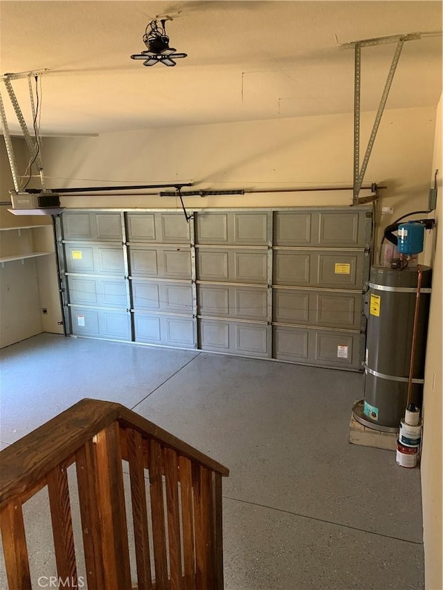 garage featuring a garage door opener and water heater