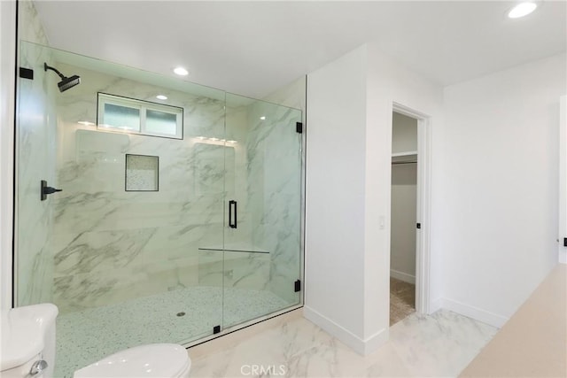 bathroom with toilet and walk in shower