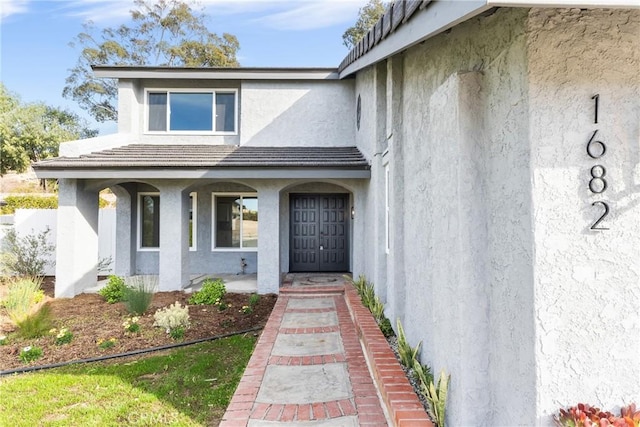 property entrance with a porch