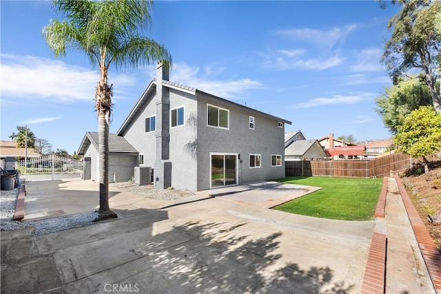 rear view of property featuring a patio area, cooling unit, and a lawn