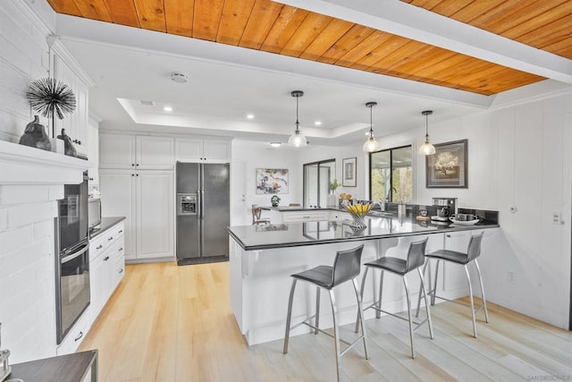 kitchen with stainless steel fridge with ice dispenser, white cabinetry, and wooden ceiling