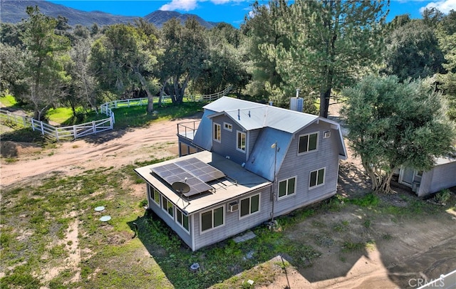 drone / aerial view featuring a mountain view