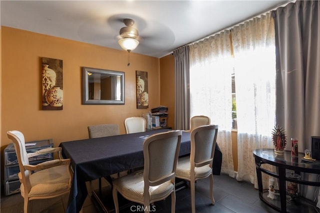 dining space with ceiling fan