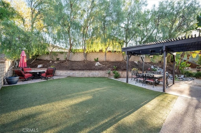 view of yard with a pergola and a patio area