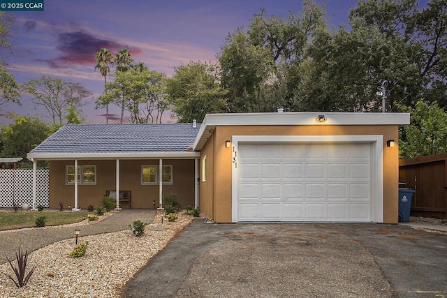 view of front of property with a garage