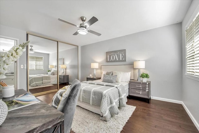 bedroom featuring dark wood-type flooring, a closet, and ceiling fan