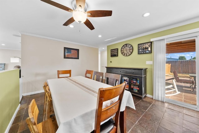 dining room featuring ceiling fan and crown molding