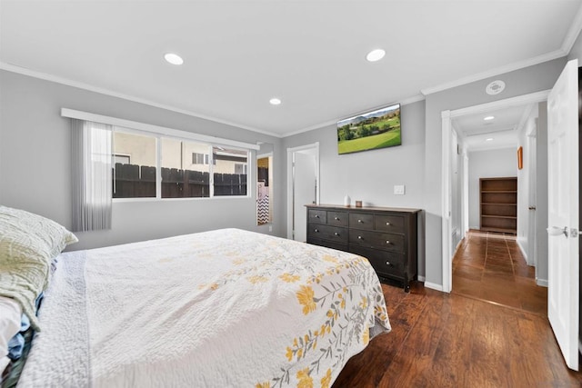 bedroom featuring dark hardwood / wood-style floors and ornamental molding