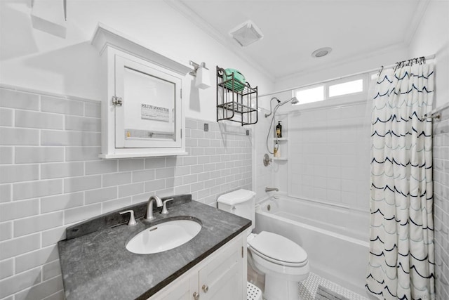 full bathroom with toilet, vanity, tile walls, ornamental molding, and shower / bath combo with shower curtain