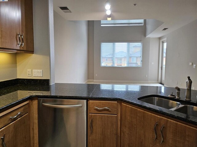 kitchen with sink and dishwasher