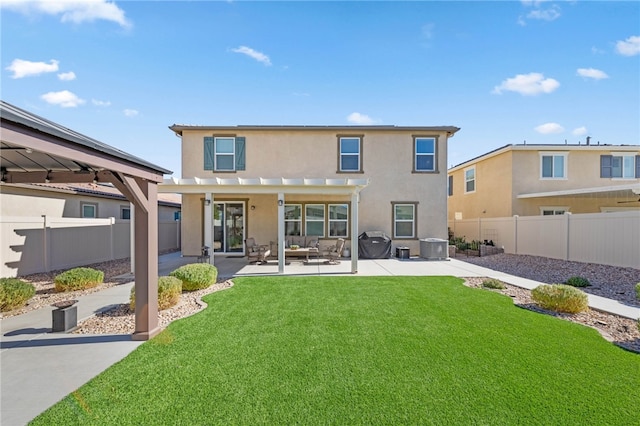 rear view of property with a lawn, a patio area, and central air condition unit