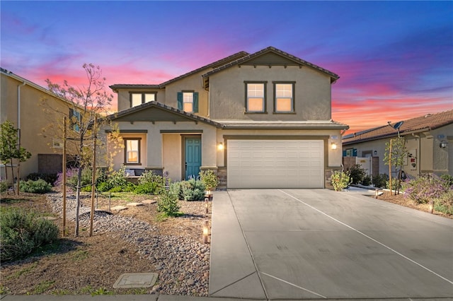 front of property featuring a garage