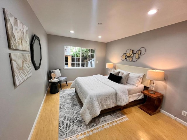 bedroom featuring hardwood / wood-style flooring