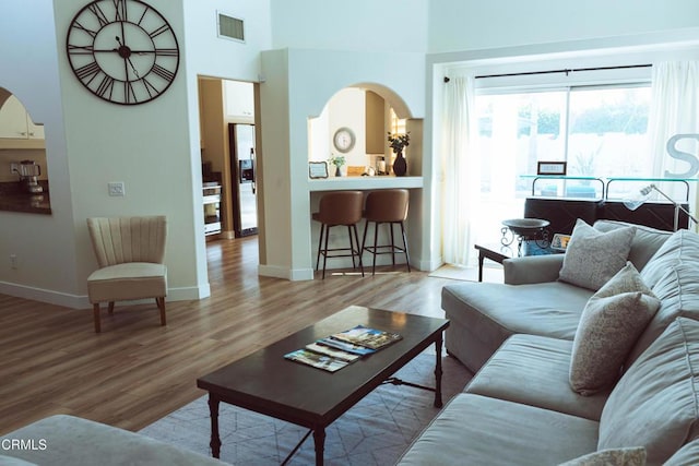 living room with light hardwood / wood-style floors