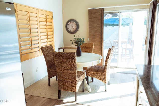 dining room with light wood-type flooring