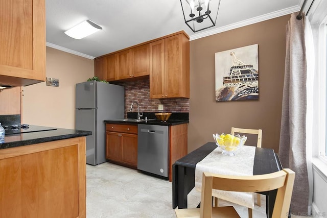 kitchen with tasteful backsplash, sink, ornamental molding, and stainless steel appliances