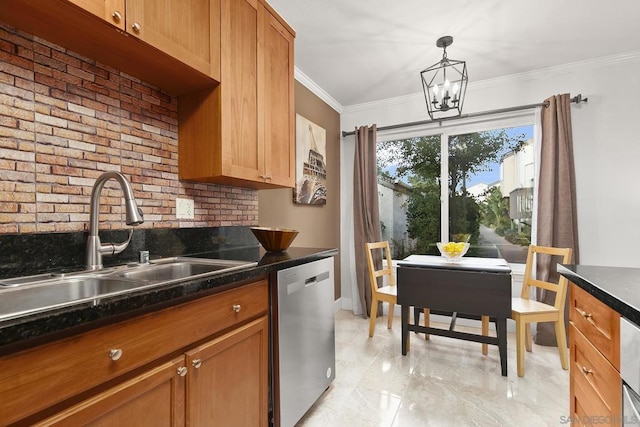 kitchen featuring pendant lighting, sink, ornamental molding, stainless steel dishwasher, and an inviting chandelier