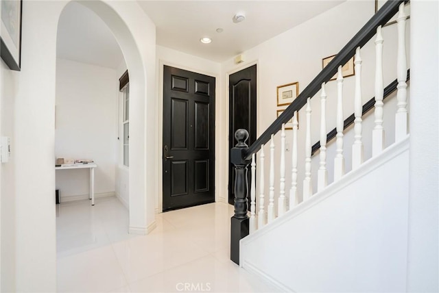 entrance foyer with light tile patterned flooring