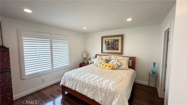 bedroom featuring dark wood-type flooring