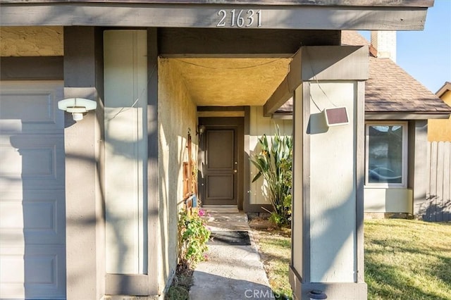 entrance to property featuring a garage