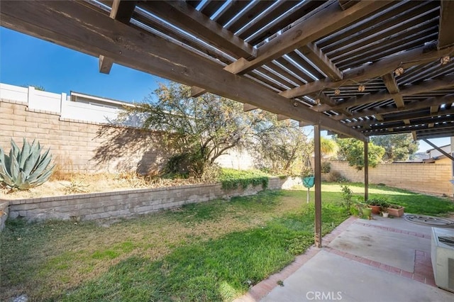 view of yard featuring a patio, cooling unit, and a pergola