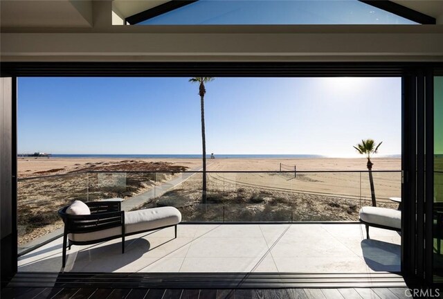 view of patio / terrace featuring a rural view and a balcony