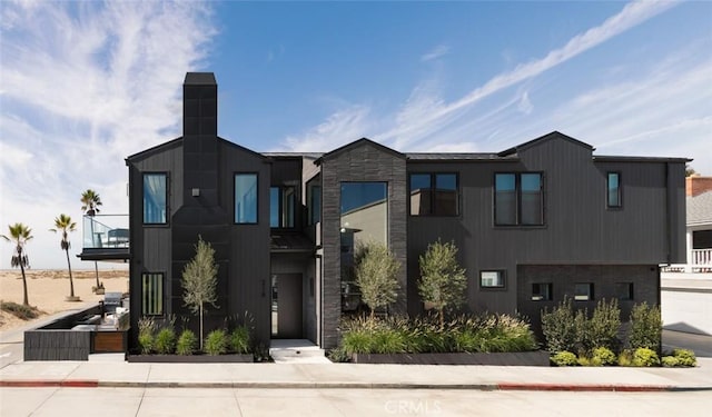 contemporary home with a balcony