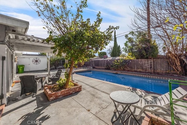 view of pool featuring a pergola and a patio area