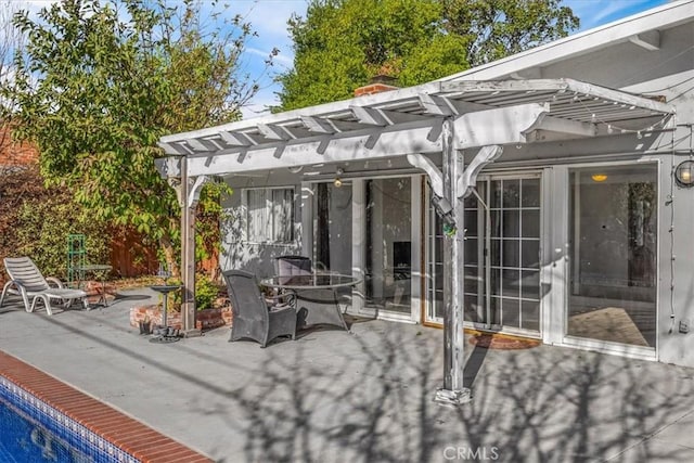 view of patio / terrace featuring a pergola