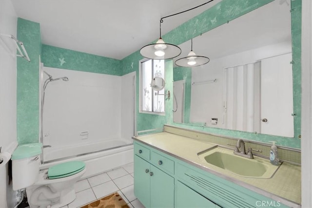 full bathroom with toilet, tile patterned floors, vanity, and bathtub / shower combination