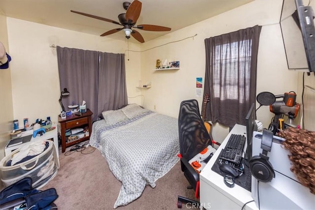 bedroom with ceiling fan and carpet flooring