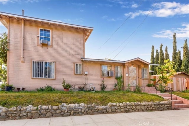 exterior space featuring a front yard