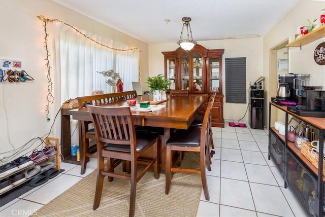 dining room featuring light tile patterned floors