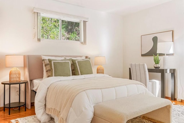 bedroom featuring hardwood / wood-style floors