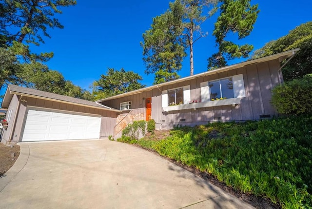 view of front of home with a garage